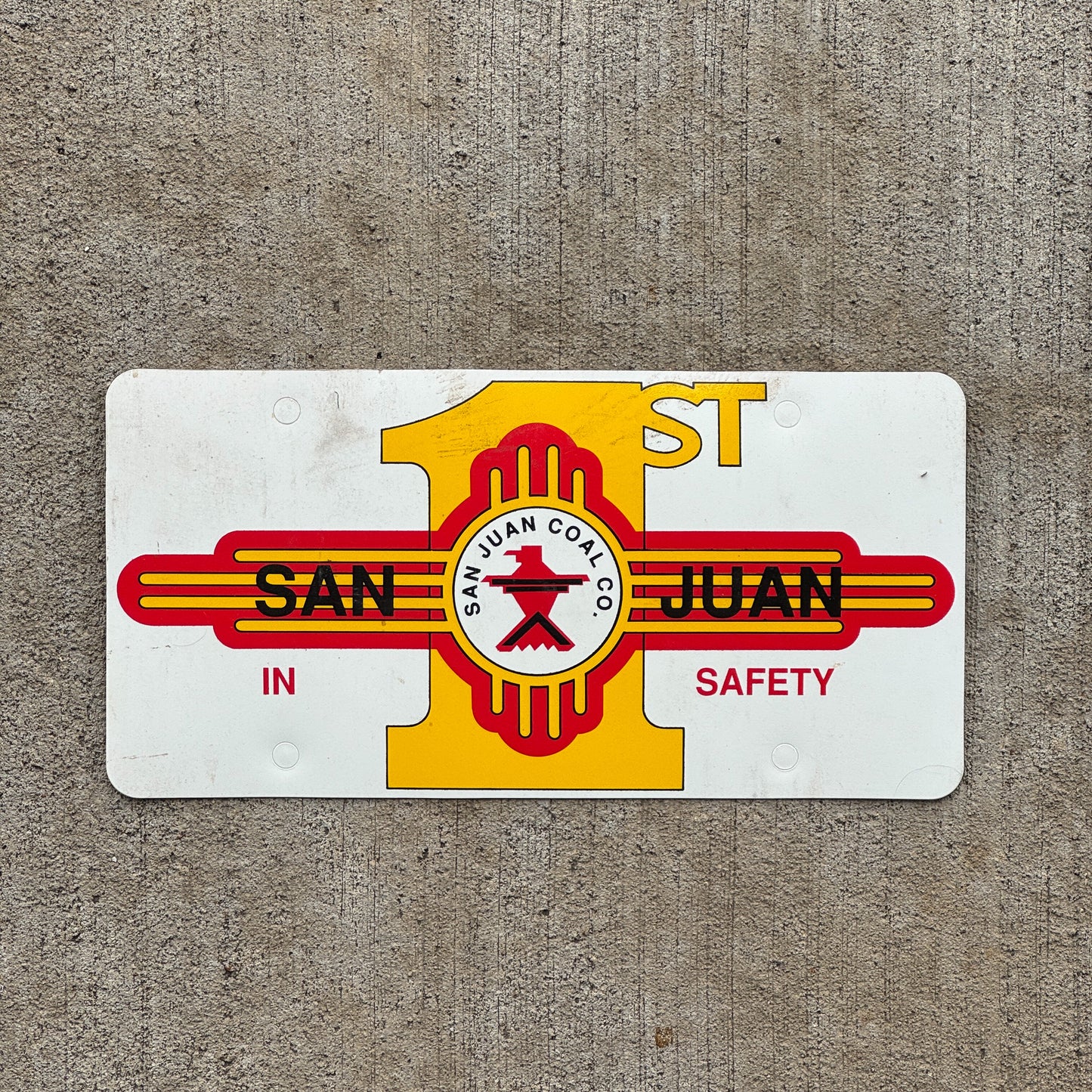 Photo of a 2000 Era San Juan New Mexico Booster License Plate Auto Tag Garage Decor Vintage San Juan Coal Co 1st in Safety Flimsy Plastic with original patina