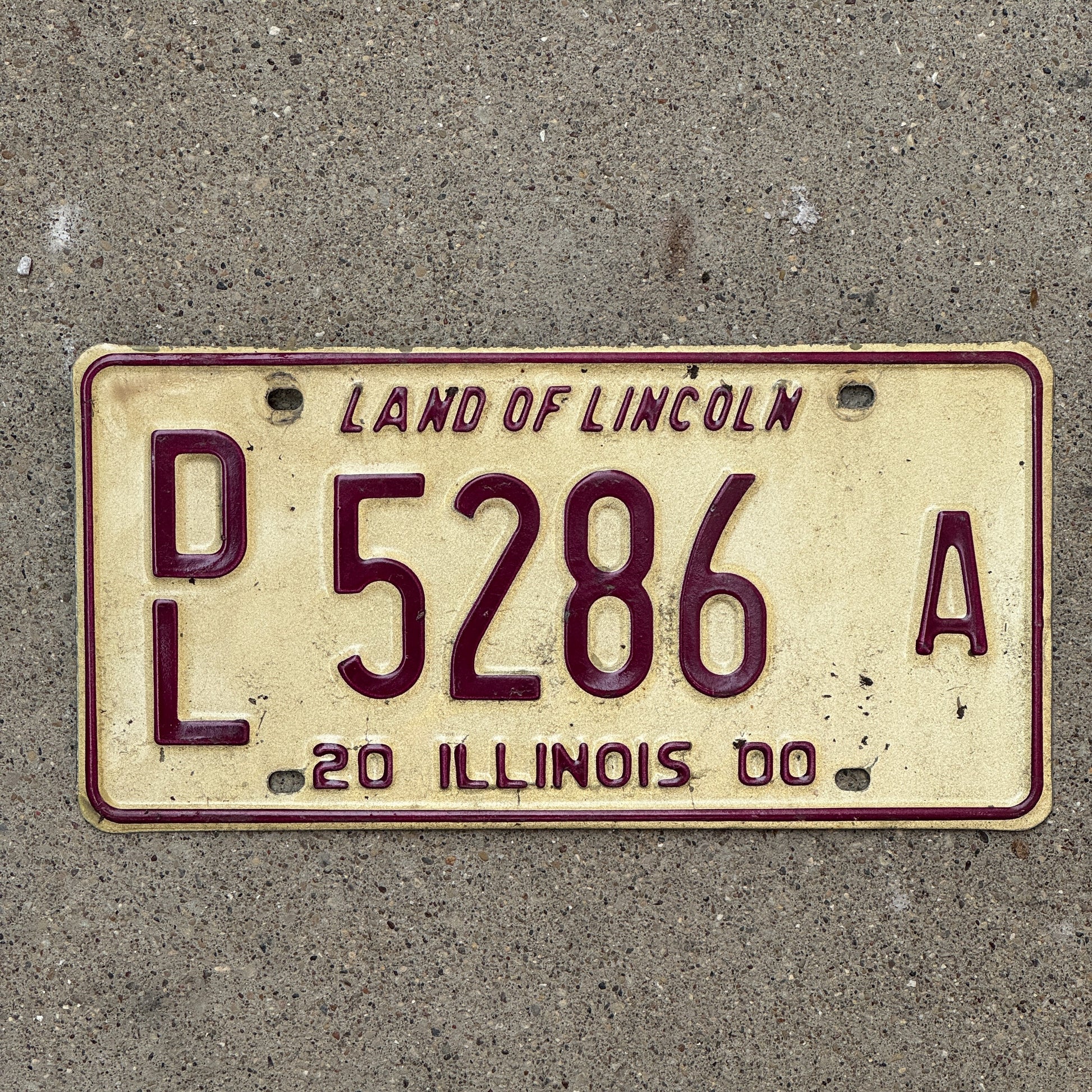 Photo of a 2000 Illinois Dealer License Plate Auto Tag 1 Vintage Garage 5286 A with original patina