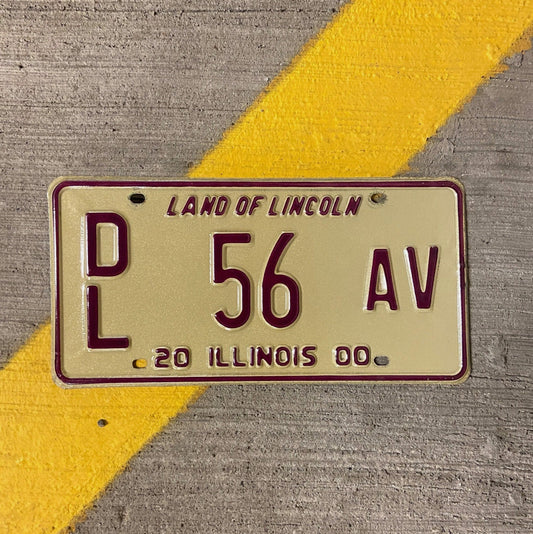 Photo of a 2000 Illinois Dealer License Plate Auto Tag Garage Decor Vintage 56 AV with original patina