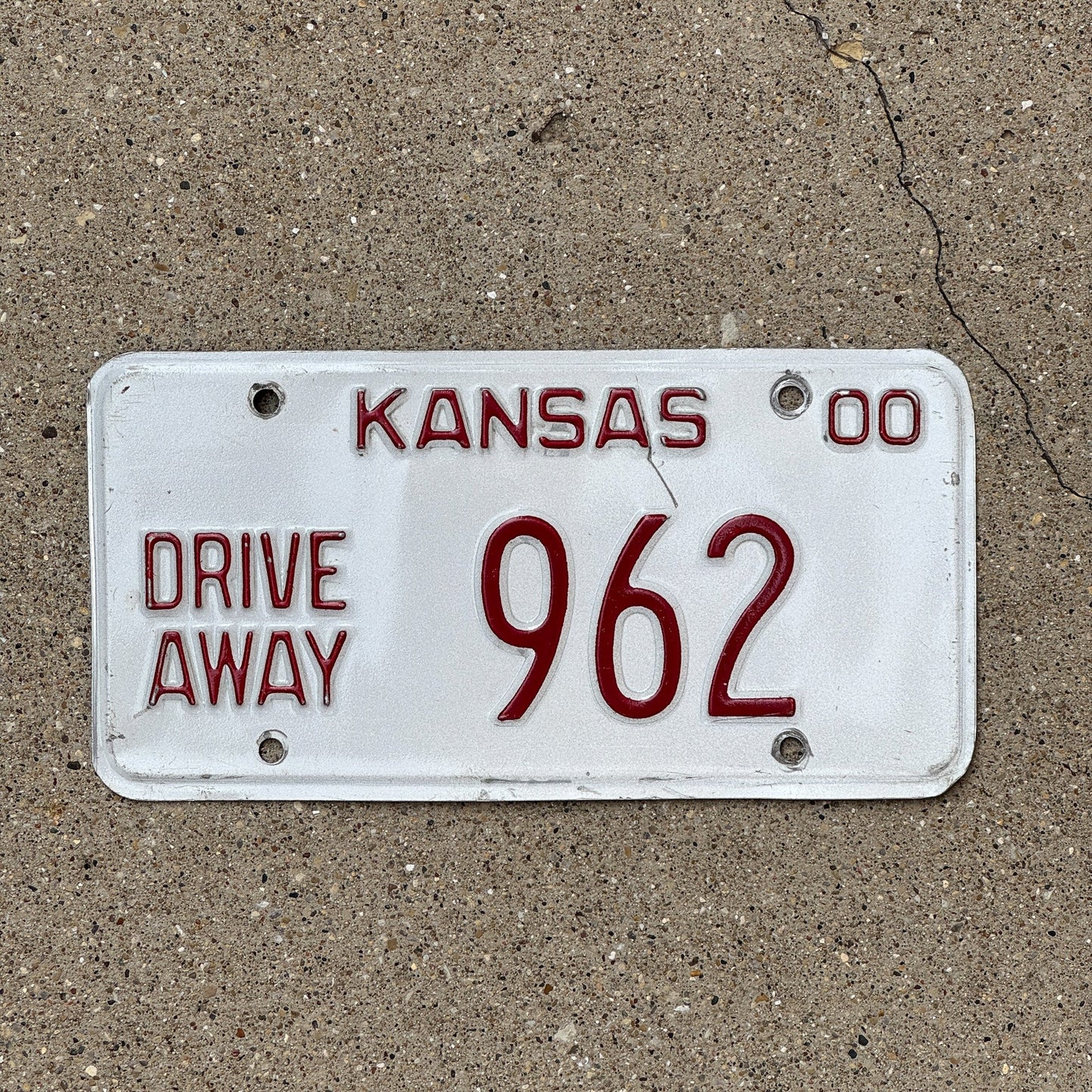 Photo of a 2000 Kansas Drive Away License Plate Auto Tag Garage Decor Vintage 962