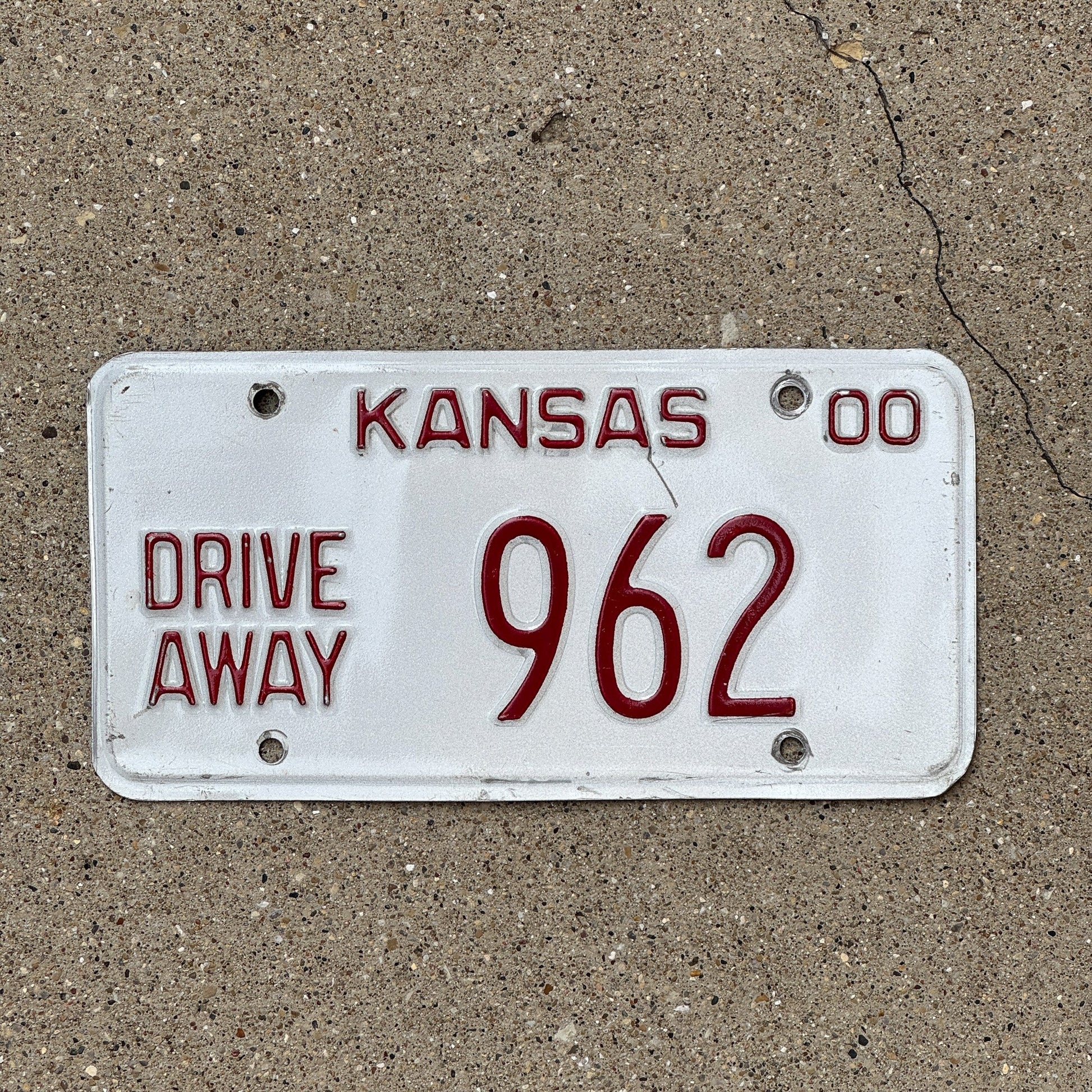 Photo of a 2000 Kansas Drive Away License Plate Auto Tag Garage Decor Vintage 962