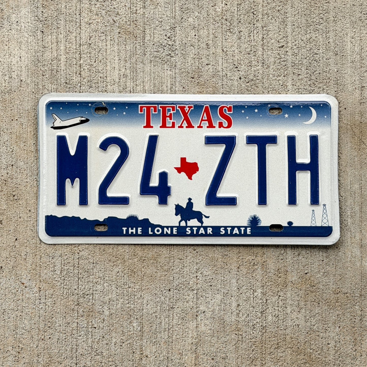 Photo of a 2000 Texas License Plate Auto Tag 2 Vintage Garage M24 ZTH with original patina