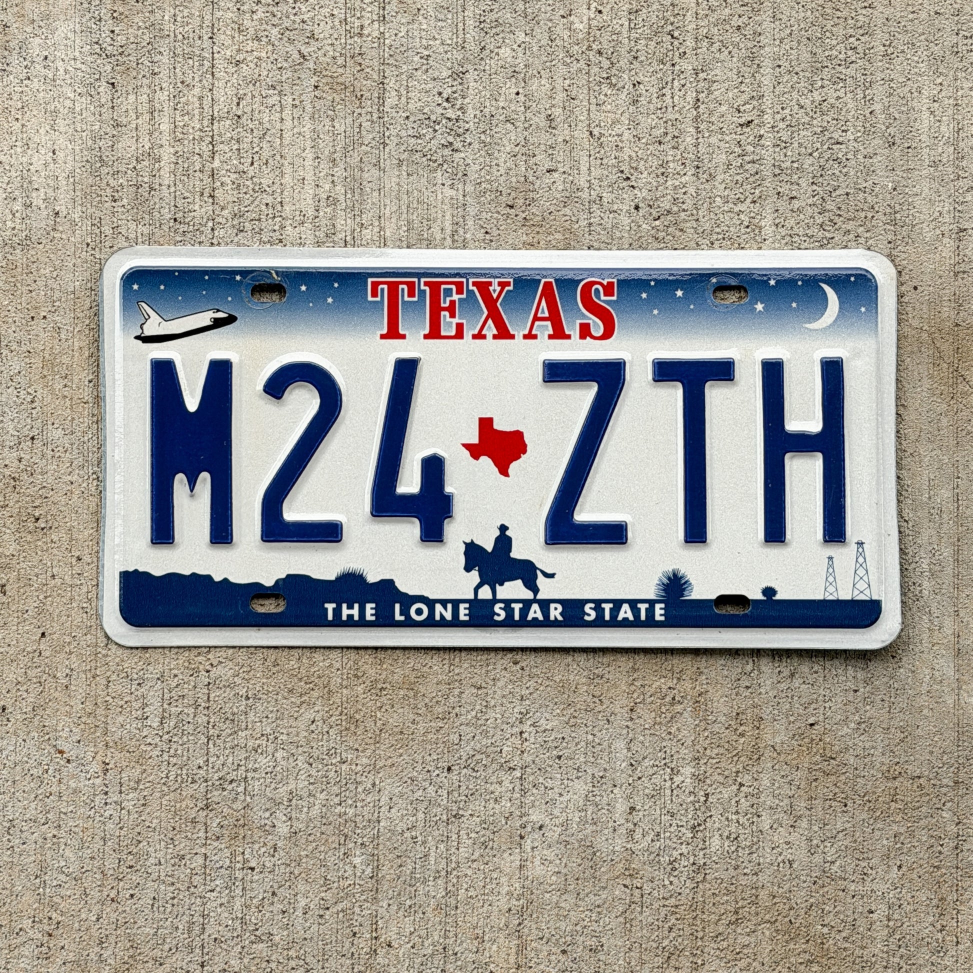 Photo of a 2000 Texas License Plate Auto Tag 2 Vintage Garage M24 ZTH with original patina