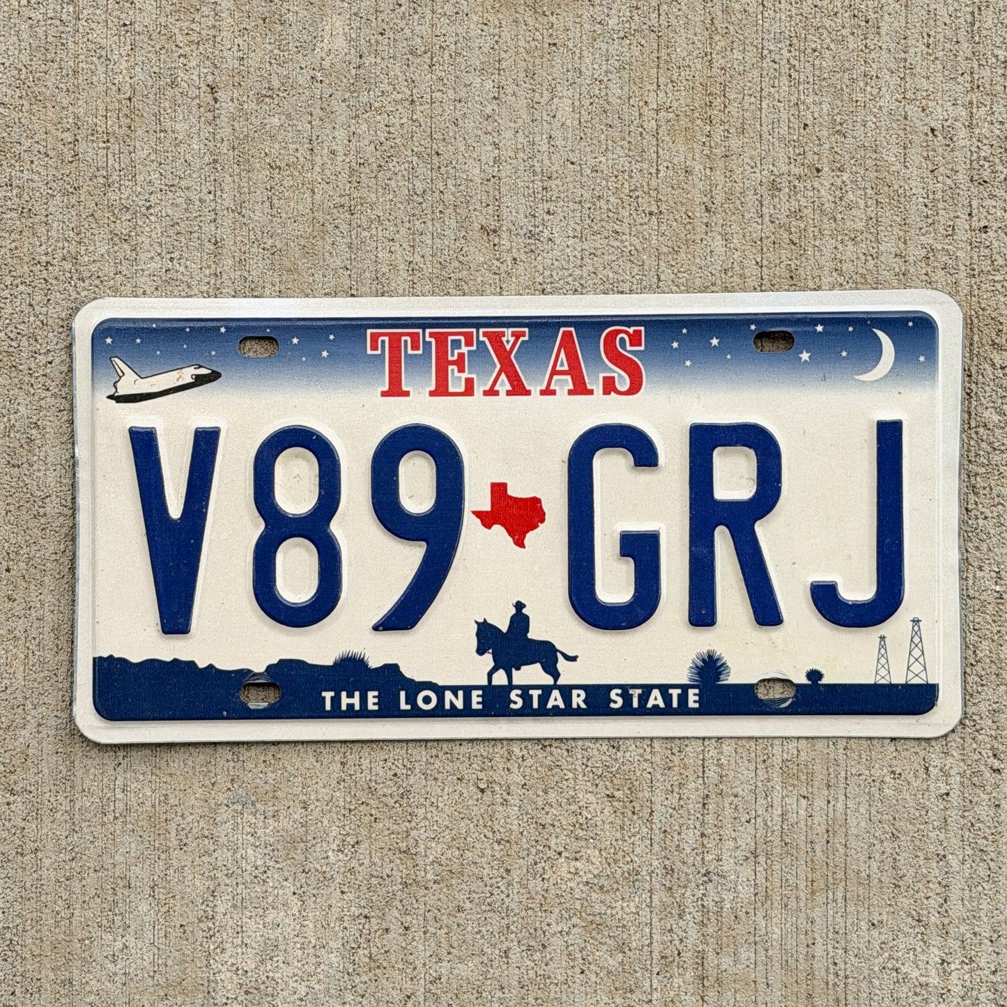 Photo of a 2000 Texas License Plate Auto Tag 2 Vintage Garage V89 GRJ with original patina