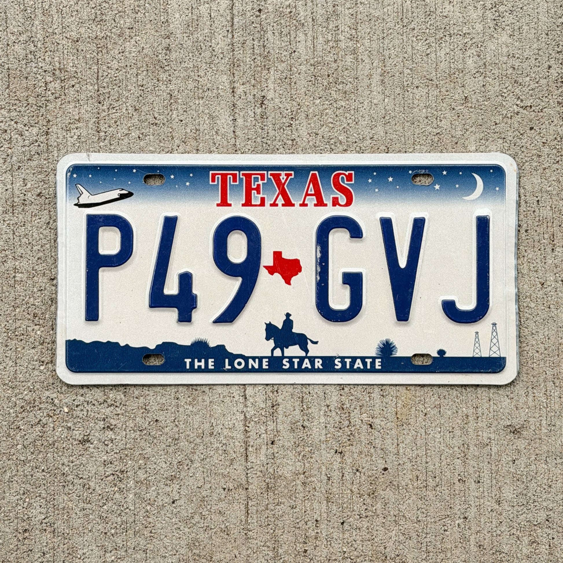 Photo of a 2000 Texas License Plate Auto Tag Garage Decor Vintage P49 GVJ with original patina