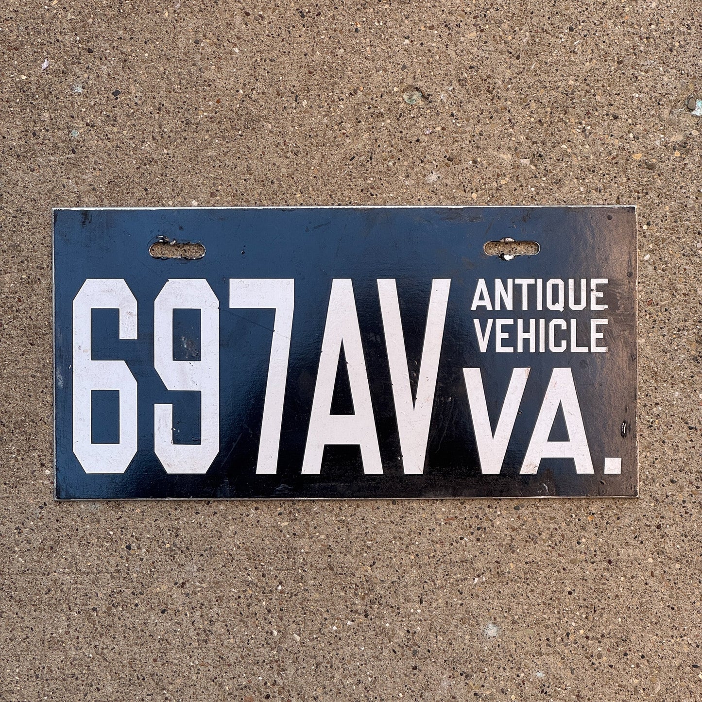 Photo of a 2000 Virginia Antique Vehicle License Plate Auto Tag Garage Decor Vintage 697 AV with original patina