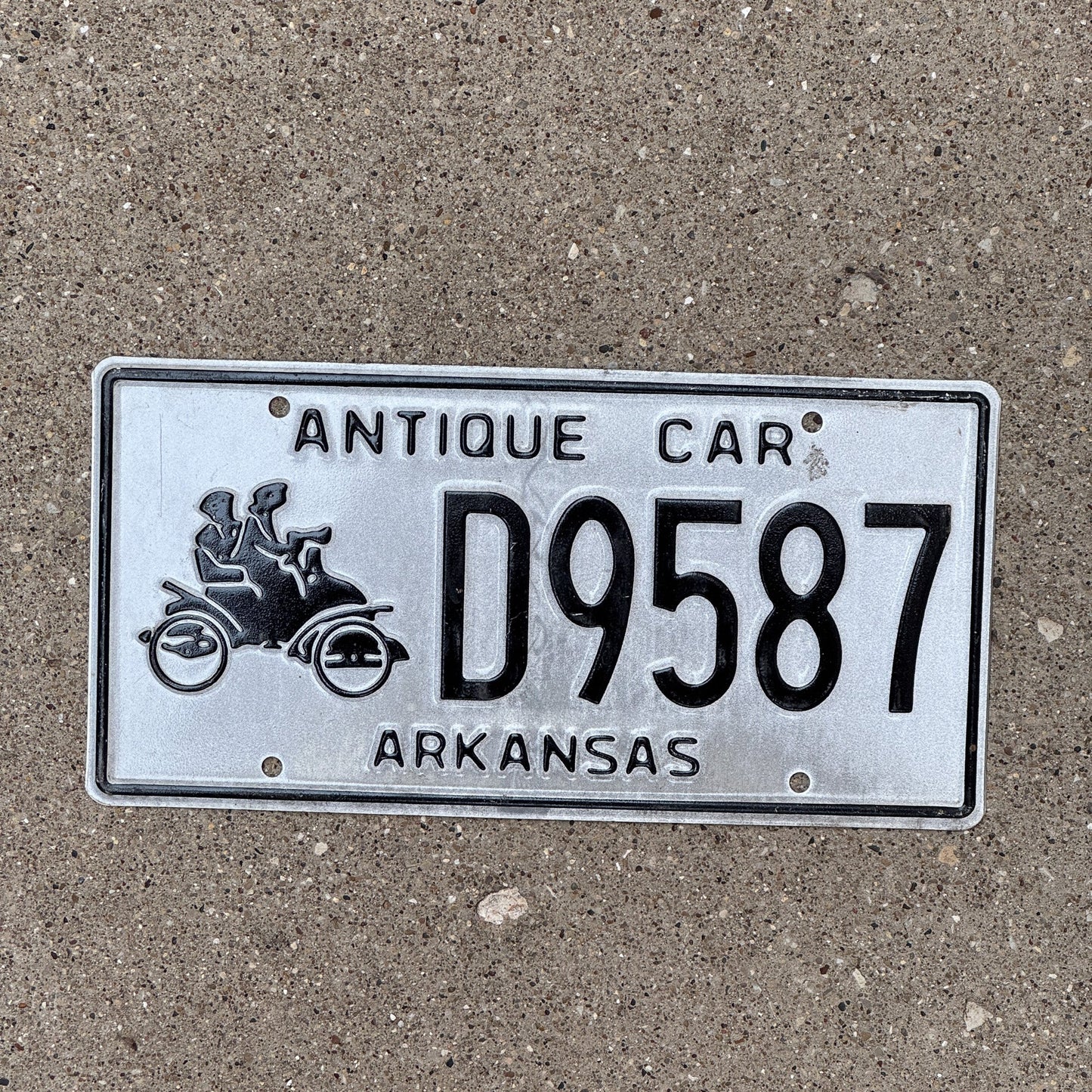 Photo of a 2000s Era Arkansas Antique Car License Plate Auto Tag Historic Vehicle D 9587