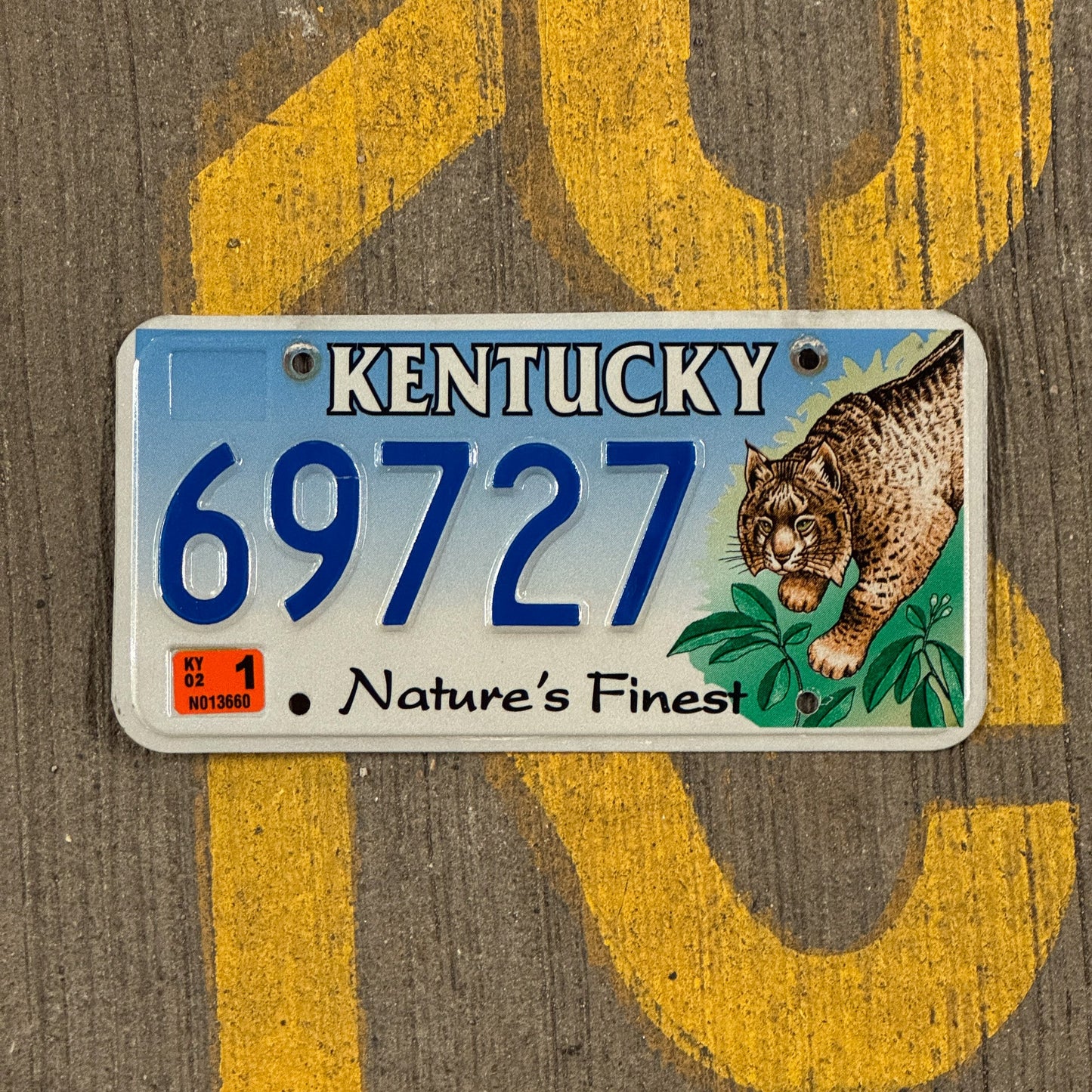 Photo of a 2001 2002 Kentucky Graphic / Specialty License Plate Auto Tag Garage Decor Vintage Nature's Finest Bobcat 69727