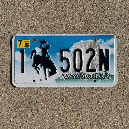 Photo of a 2001 2002 Wyoming License Plate Auto Tag Garage Decor Vintage Cowboy Rodeo 1 502 N with original patina