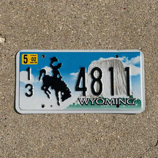 Photo of a 2001 2002 Wyoming License Plate Auto Tag Garage Decor Vintage Cowboy Rodeo 13 4811 with original patina