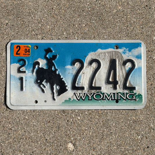 Photo of a 2001 2004 Wyoming License Plate Auto Tag Garage Decor Vintage Cowboy Rodeo 21 2242 with original patina