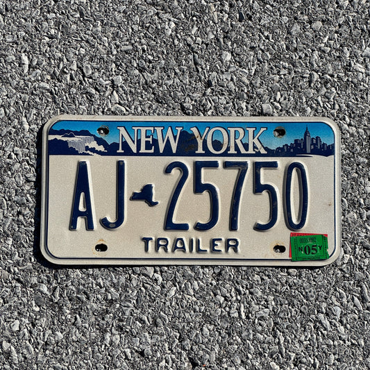 Photo of a 2001 2005 New York Trailer License Plate Auto Tag Garage Decor Vintage AJ 25750