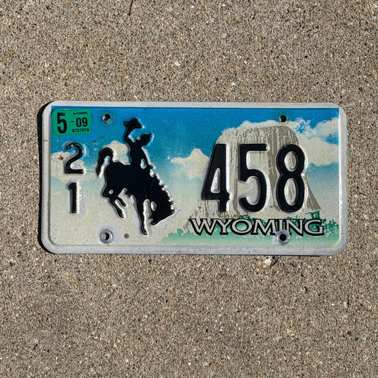 Photo of a 2001 2009 Wyoming License Plate Auto Tag Garage Decor Vintage Cowboy Rodeo 21 458 with original patina