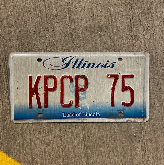 Photo of a 2001 Illinois Vanity License Plate Auto Tag Garage Decor Vintage KPCP 75