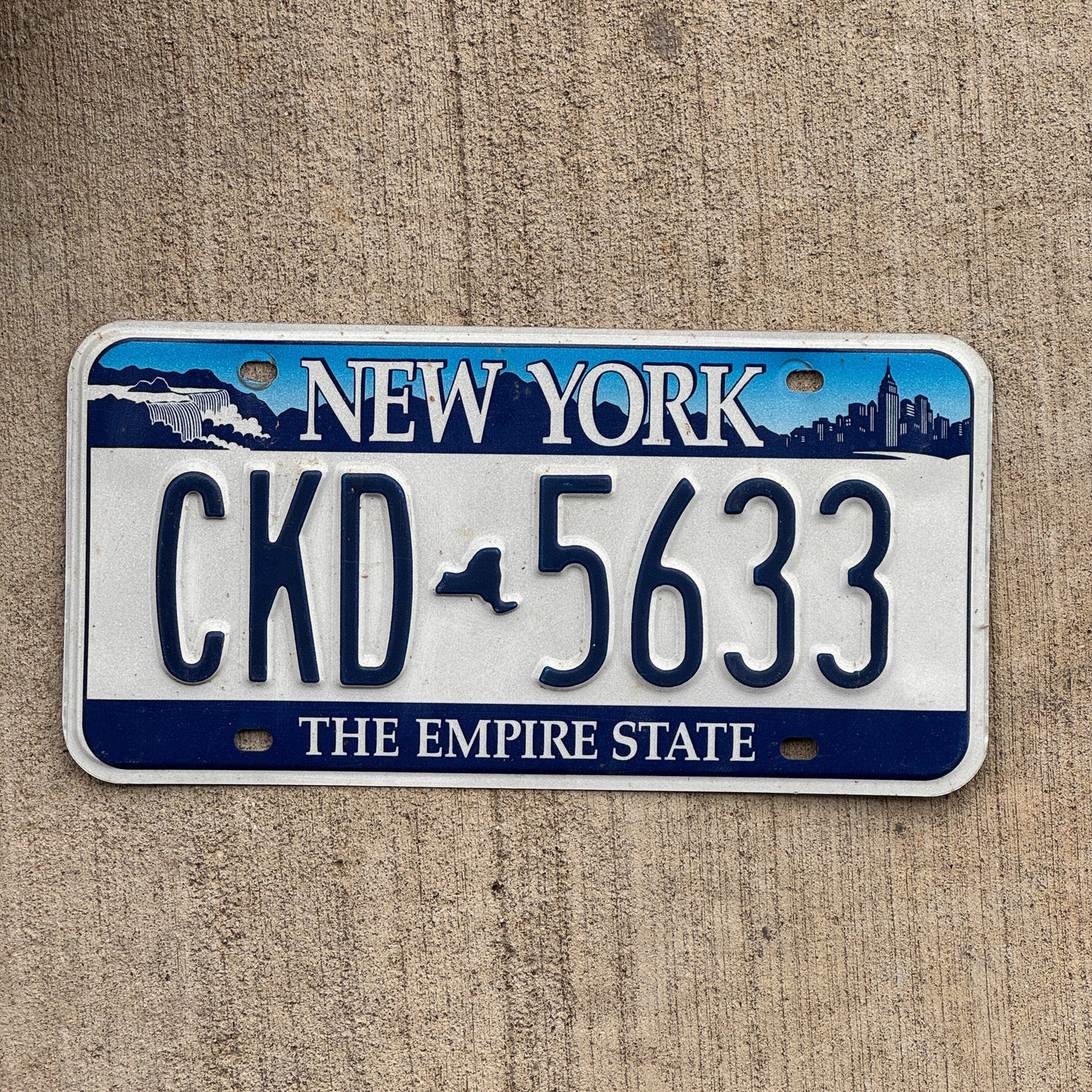 Photo of a 2001 New York License Plate Auto Tag Garage Decor Vintage CKD 5633