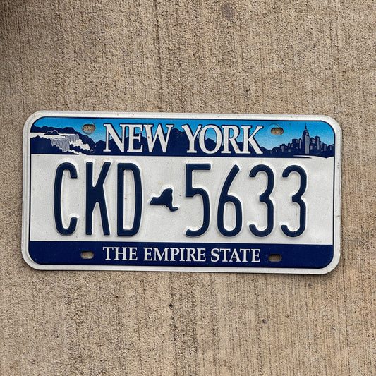 Photo of a 2001 New York License Plate Auto Tag Garage Decor Vintage CKD 5633