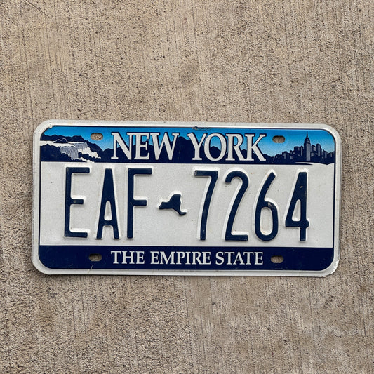 Photo of a 2001 New York License Plate Auto Tag Garage Decor Vintage EAF 7264