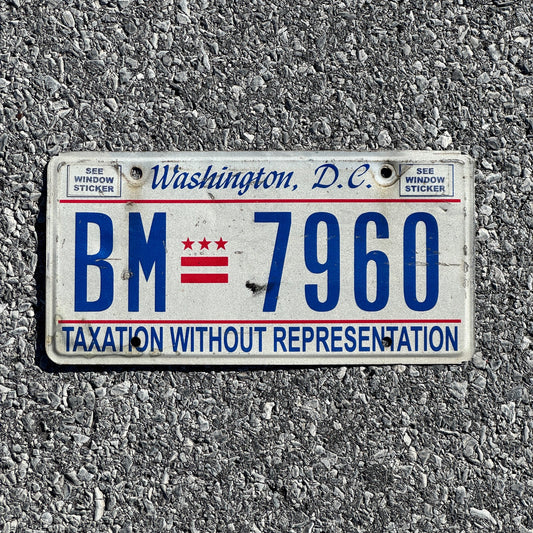 Photo of a 2001 Washington D.C. License Plate Auto Tag Garage Decor Vintage Taxation Without Representation BM 7960