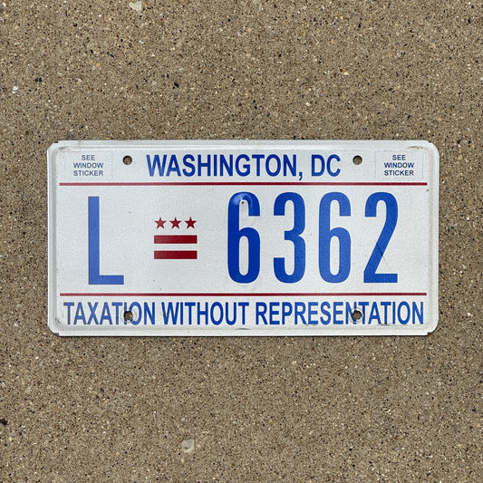Photo of a 2001 Washington DC Livery License Plate Auto Tag Garage Decor Vintage Limousine Limo L 6362
