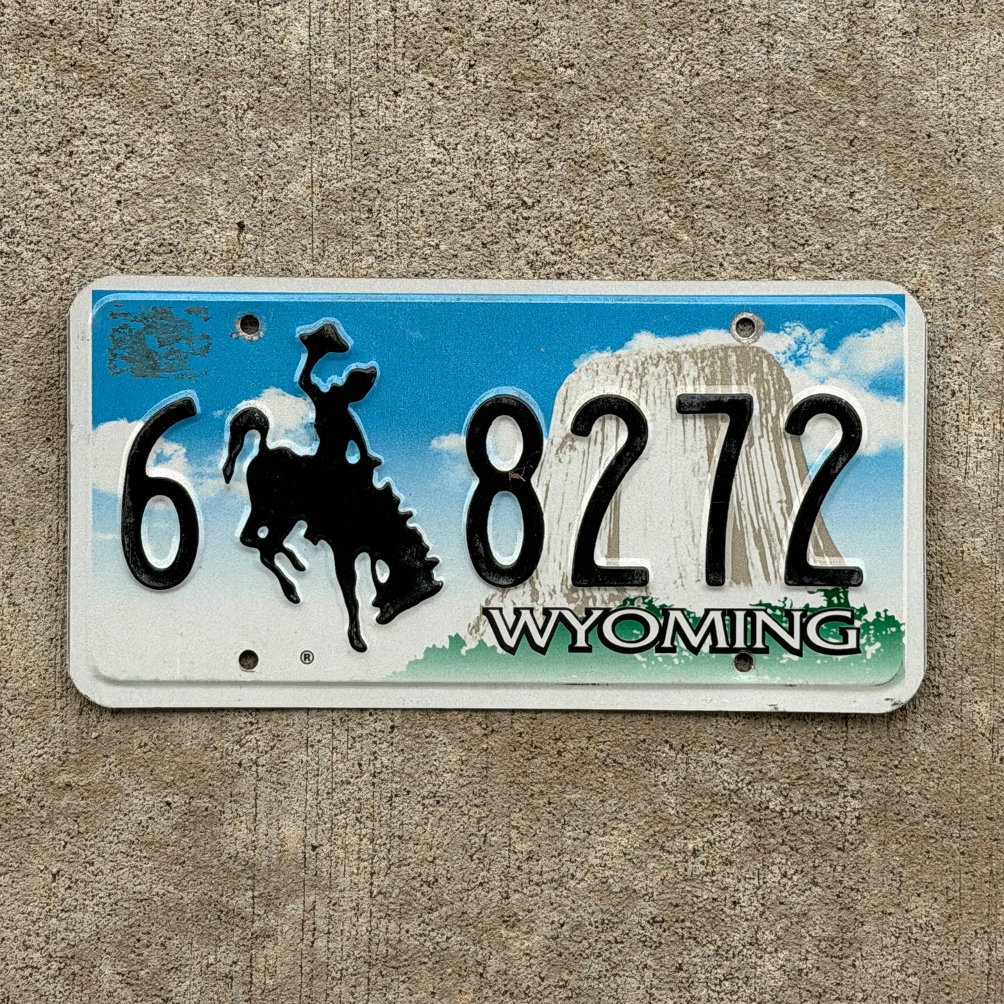 Photo of a 2001 Wyoming License Plate Auto Tag Garage Decor Vintage 6 8272 with original patina