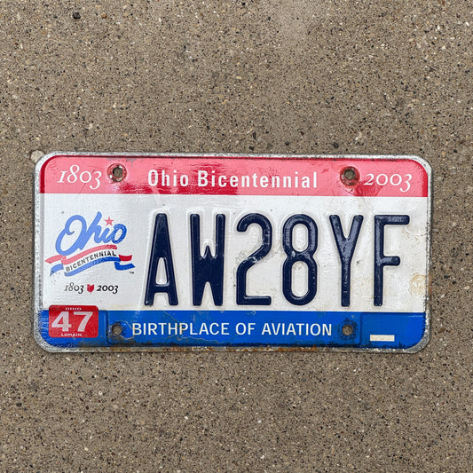 Photo of a 2002 2003 Ohio License Plate Auto Tag 1 Vintage Garage AW 28 YF with original patina