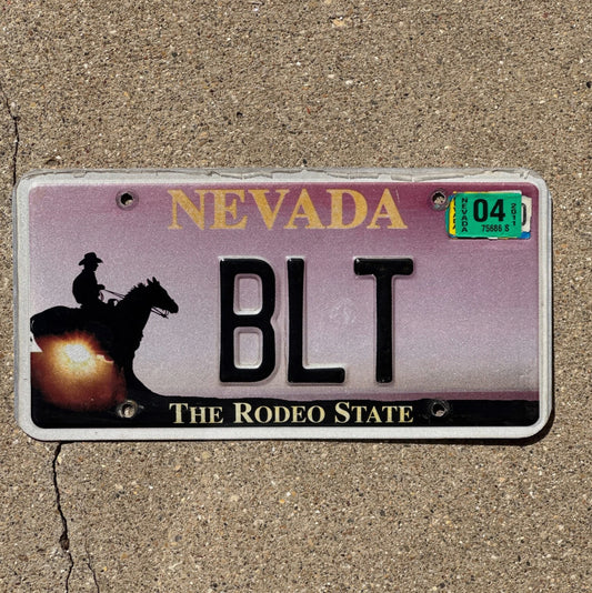 Photo of a 2002 2004 Nevada Graphic Vanity License Plate Auto Tag Garage Decor Vintage Rodeo Kitchen Decor Sandwich BLT with original patina