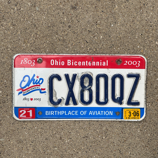 Photo of a 2002 2006 Ohio License Plate Auto Tag Garage Decor Vintage CX 80 QZ with original patina