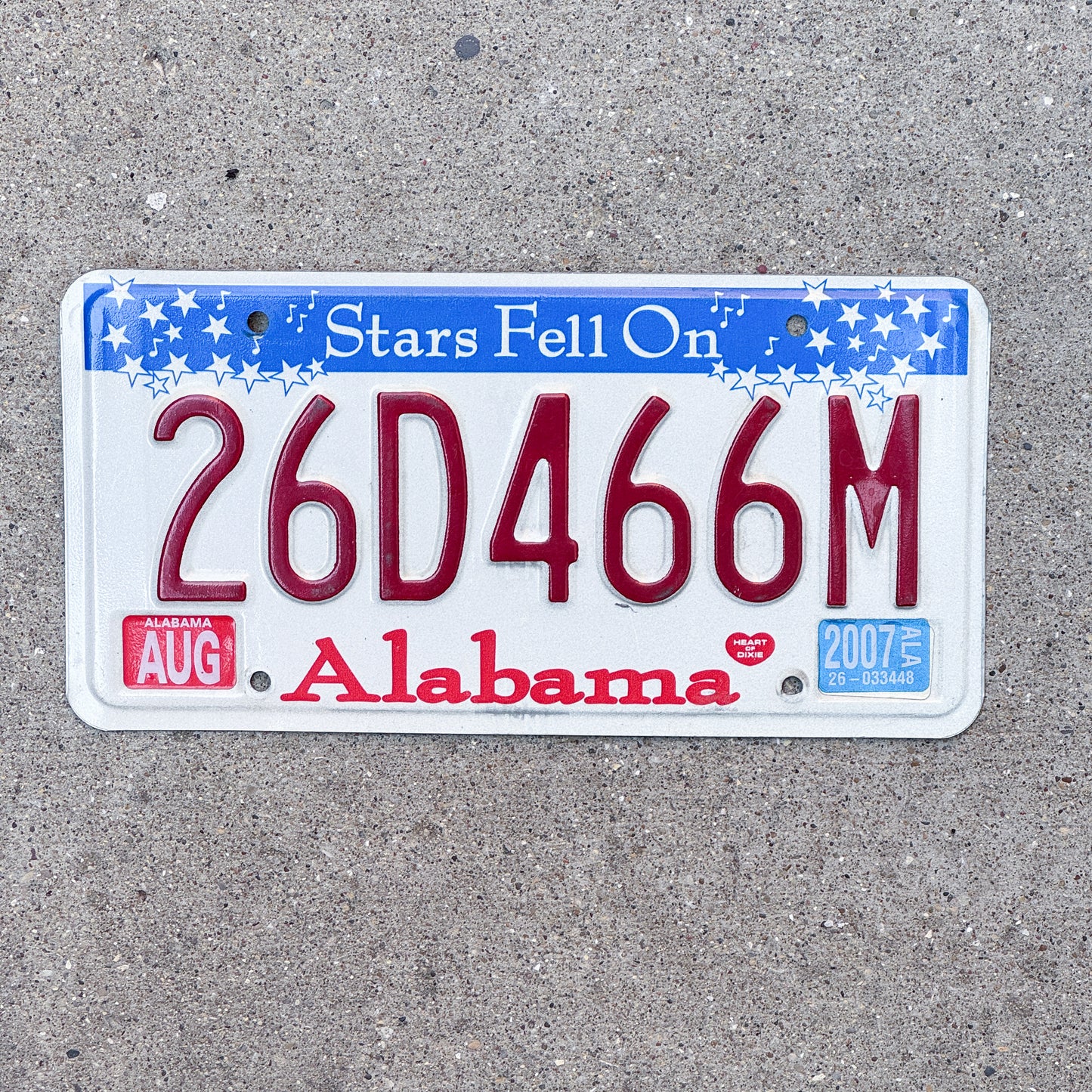 Photo of a 2002 2007 Alabama License Plate Auto Tag Garage Decor Vintage Stars 26 D 466M with original patina