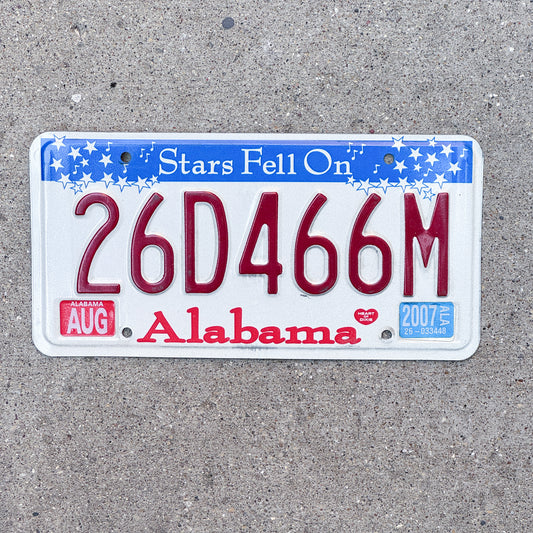 Photo of a 2002 2007 Alabama License Plate Auto Tag Garage Decor Vintage Stars 26 D 466M with original patina