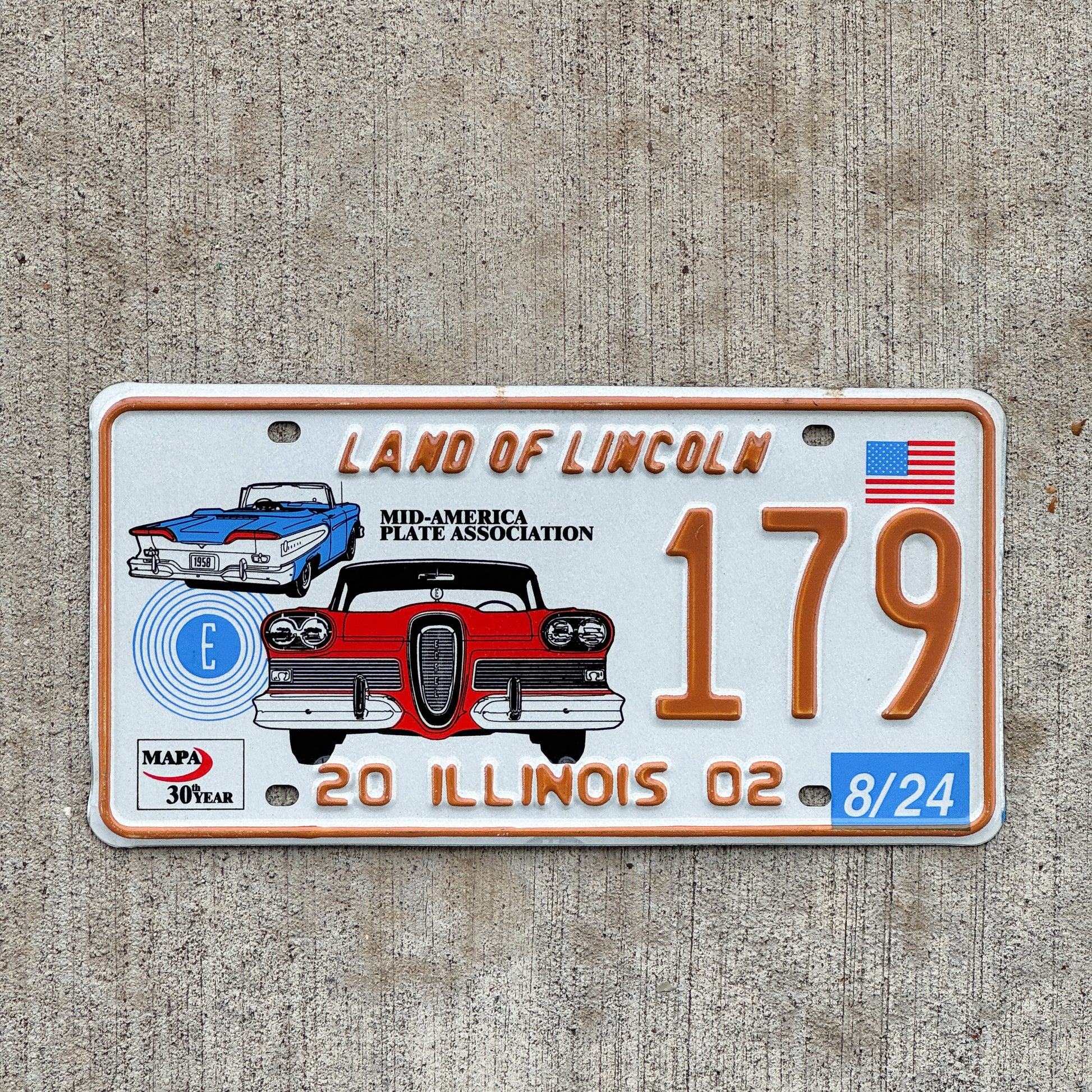 Photo of a 2002 2024 Illinois Event License Plate Auto Tag Garage Decor Vintage Ford Edsel MAPA 179 with original patina
