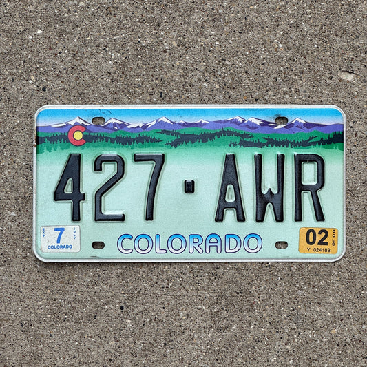 Photo of a 2002 Colorado Graphic / Specialty License Plate Auto Tag Garage Decor Vintage Purple Mountain designer base 427 AWR