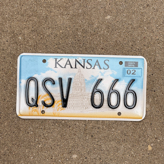 Photo of a 2002 Kansas License Plate Auto Tag Garage Decor Vintage Devil Evil Repeat QSV 666
