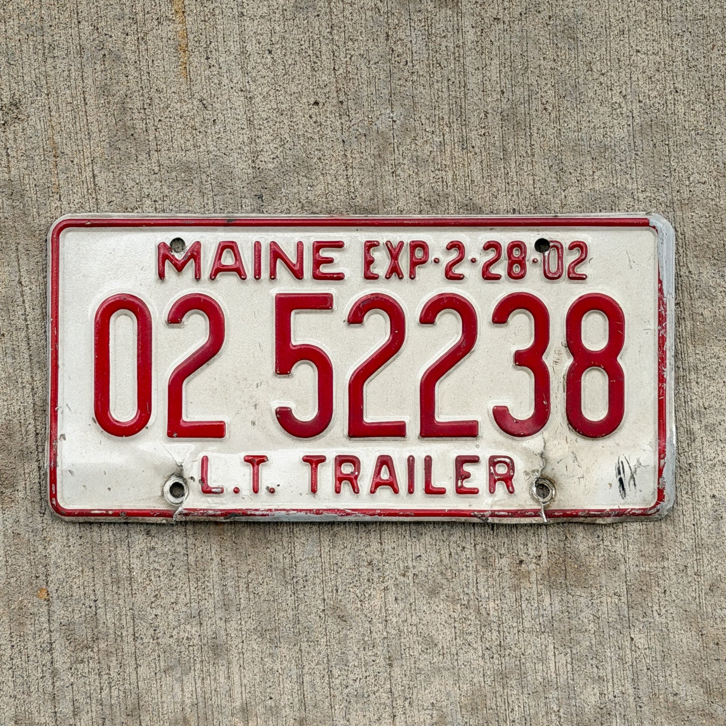 Photo of a 2002 Maine Trailer License Plate Auto Tag Garage Decor Vintage 02 52238 with original patina