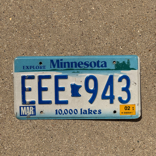 Photo of a 2002 Minnesota License Plate Auto Tag Garage Decor Vintage Repeat Repeating EEE 943