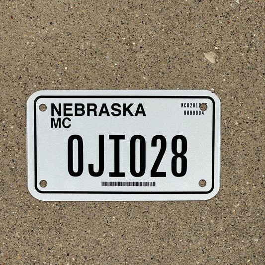 Photo of a 2002 Nebraska Motorcycle License Plate Auto Tag Garage Decor Vintage 0JI 028