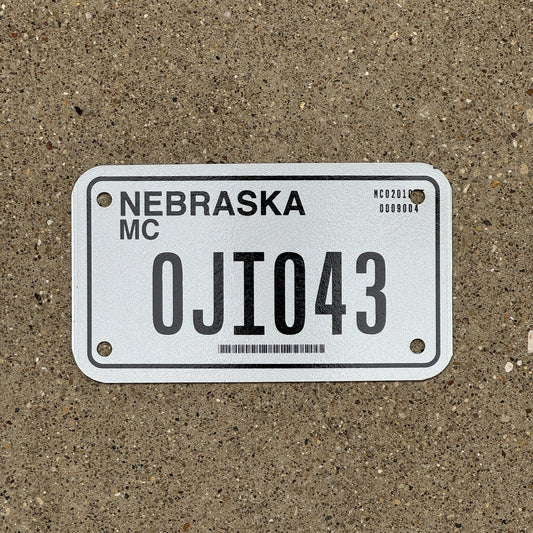 Photo of a 2002 Nebraska Motorcycle License Plate Auto Tag Garage Decor Vintage 0JI 043