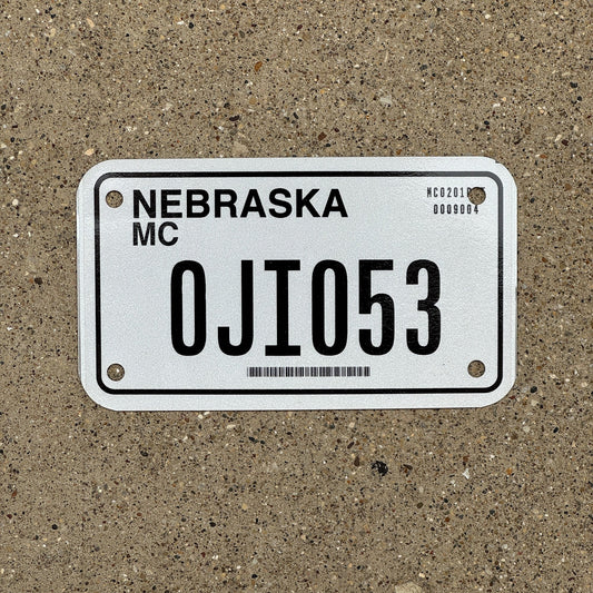 Photo of a 2002 Nebraska Motorcycle License Plate Auto Tag Garage Decor Vintage 0JI 053