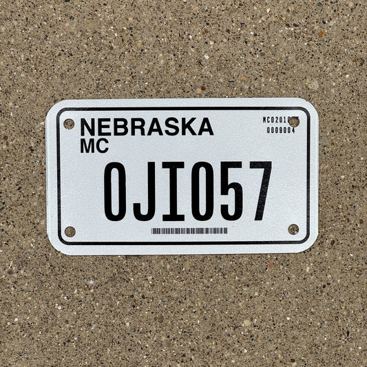 Photo of a 2002 Nebraska Motorcycle License Plate Auto Tag Garage Decor Vintage 0JI 057
