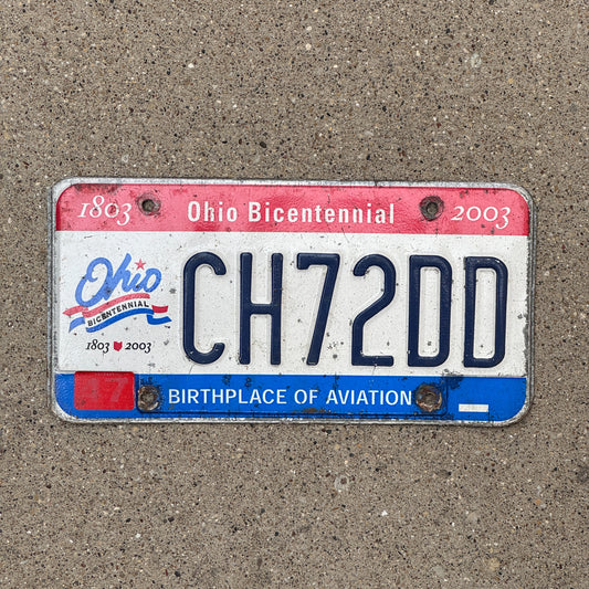 Photo of a 2002 Ohio License Plate Auto Tag 2 Vintage Garage CH 72 DD with original patina