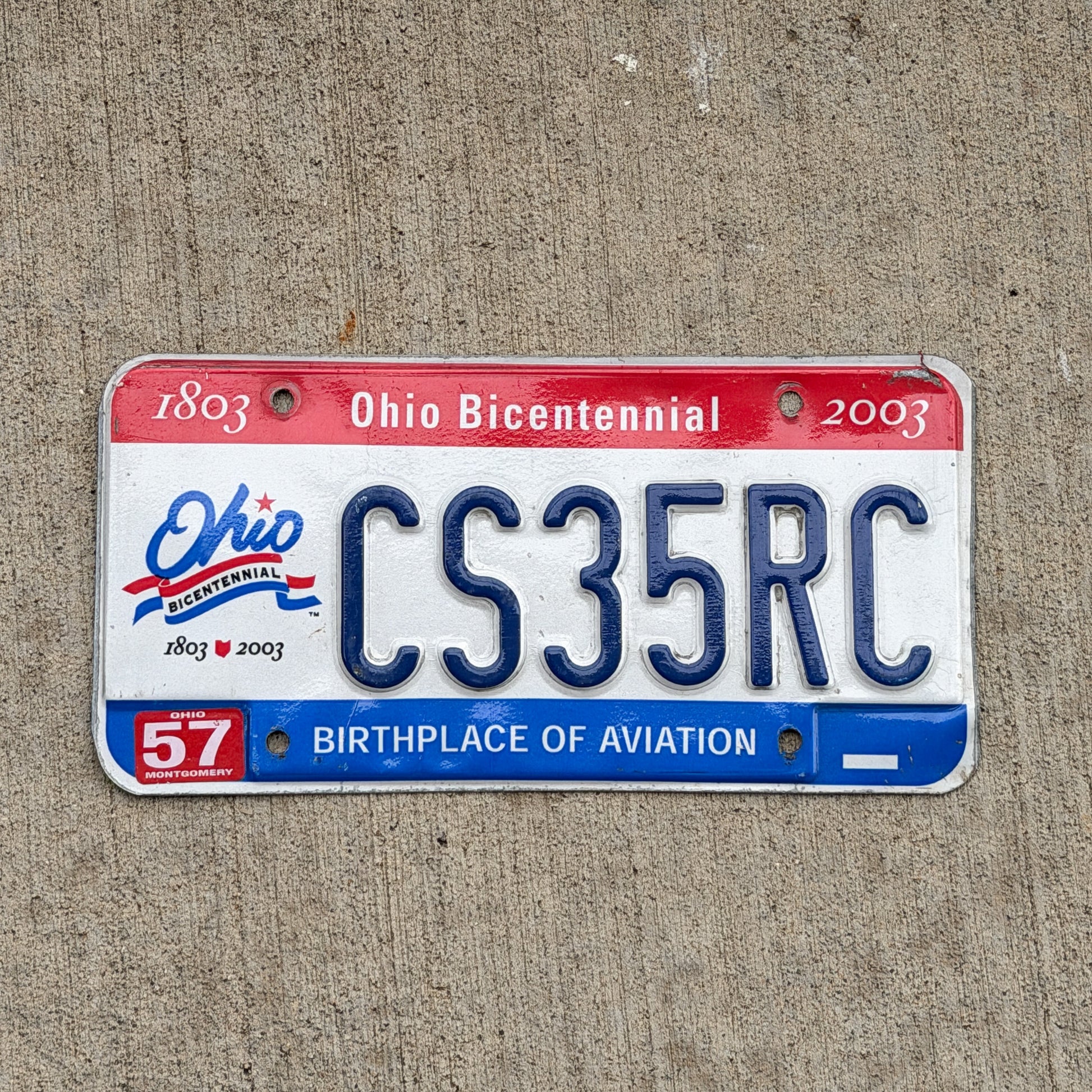 Photo of a 2002 Ohio License Plate Auto Tag Garage Decor Vintage Bicentennial CS 35 RC with original patina