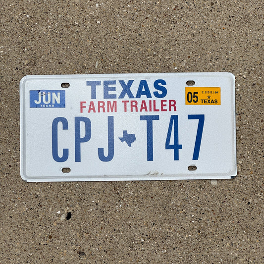 Photo of a 2003 2005 Texas Farm Trailer License Plate Auto Tag Garage Decor Vintage CPJ T47