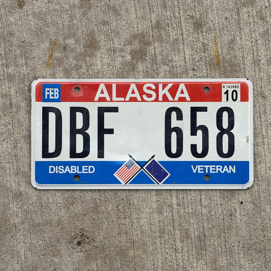 Photo of a 2003 2010 Alaska Disabled Veteran License Plate Auto Tag Garage Decor Vintage DBF 658 with original patina