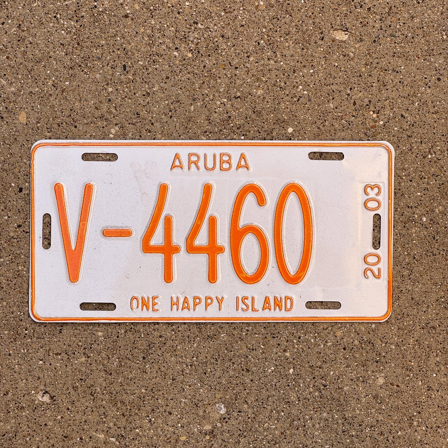 Photo of a 2003 Aruba Rental Car License Plate Auto Tag Garage Decor Vintage One Happy Island V 4460 with original patina