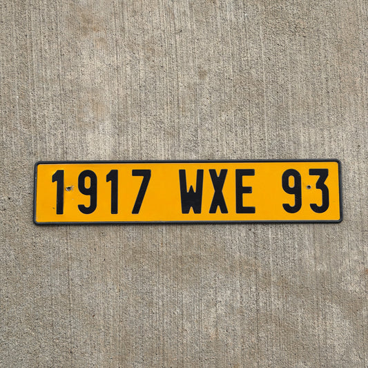 Photo of a 2003 France Export License Plate Auto Tag Garage Decor Vintage French Seine-Saint-Denis 1917 WXE 93 with original patina