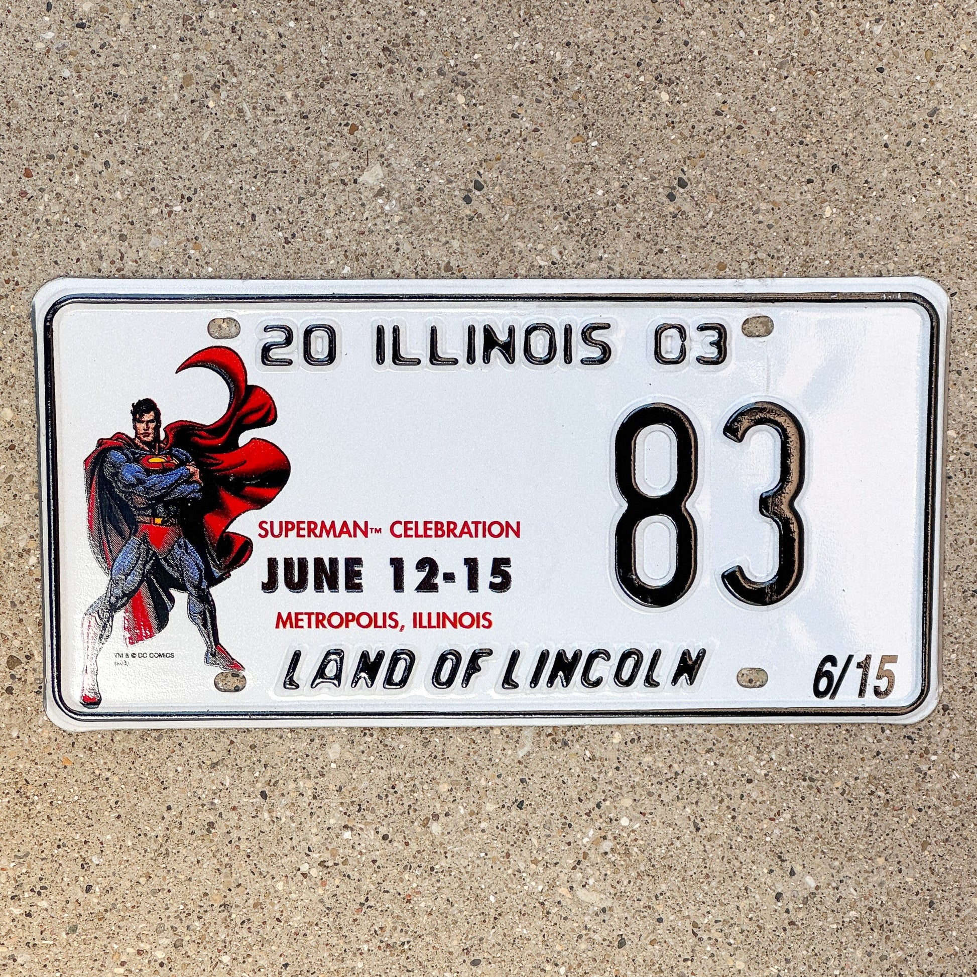 Photo of a 2003 Illinois Event License Plate Auto Tag 1 Garage Decor Metropolis Illinois Superman Comics 83 with original patina