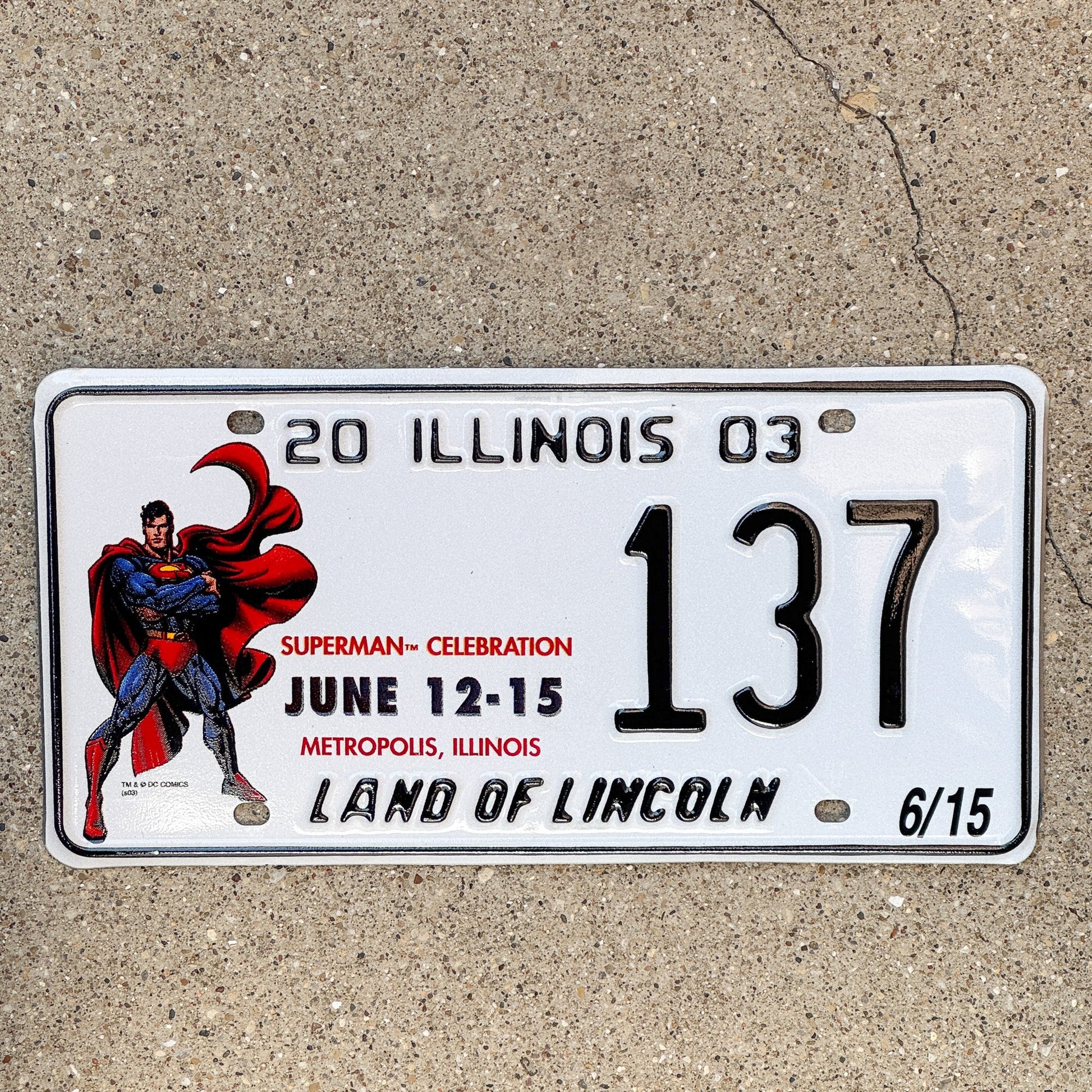 Photo of a 2003 Illinois Event License Plate Auto Tag 2 Garage Decor Metropolis Illinois Superman Comics 137 with original patina