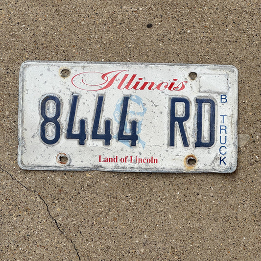 Photo of a 2003 Illinois TRUCK License Plate Auto Tag Garage Decor Vintage Repeat Repeating 8 444 RD