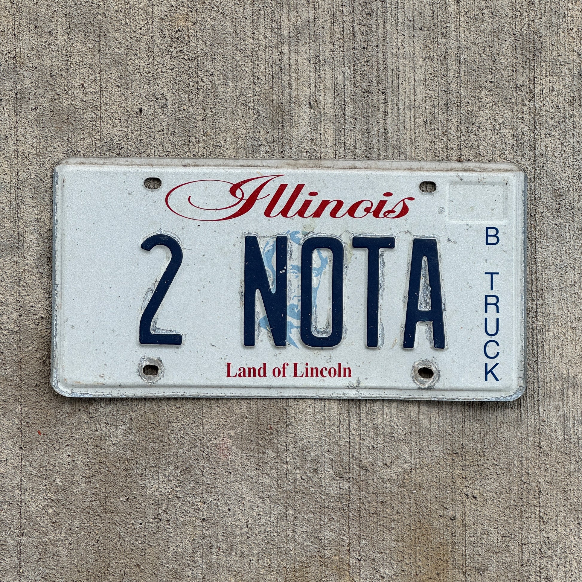 Photo of a 2003 Illinois Vanity Truck License Plate Auto Tag 2 Vintage Garage 2 NOTA with original patina