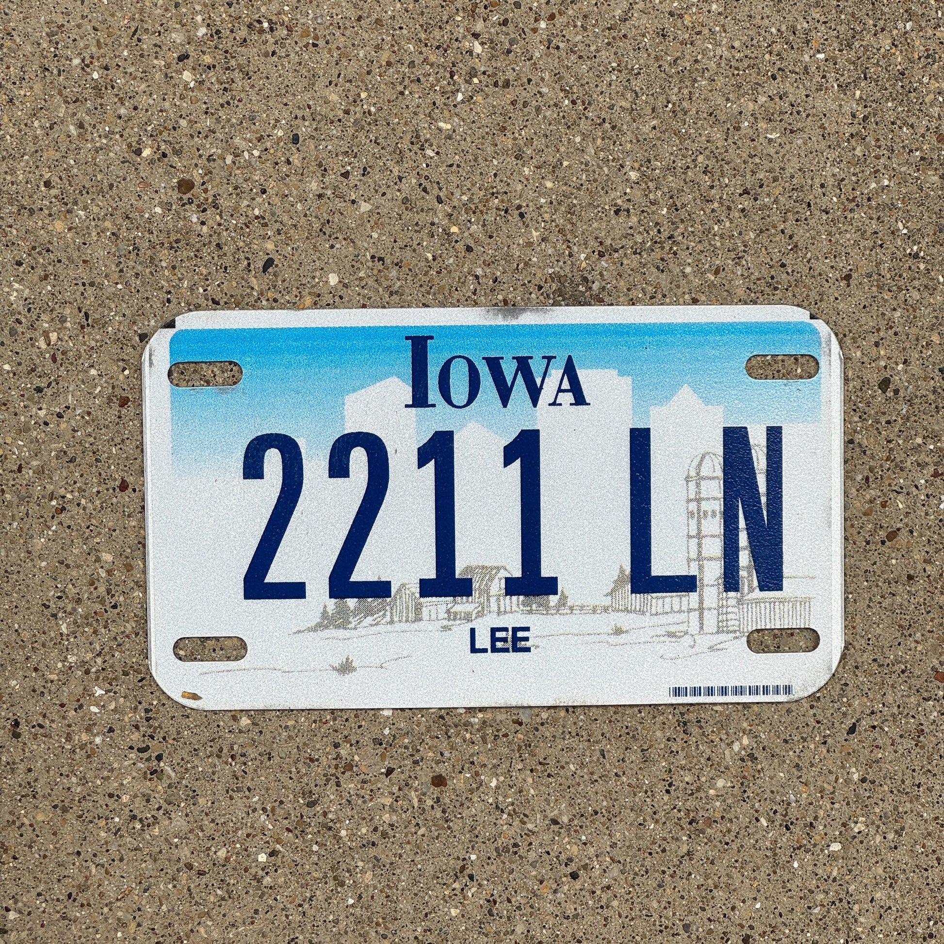 Photo of a 2003 Iowa Motorcycle License Plate Auto Tag Garage Decor Vintage Lee County 2211 LN