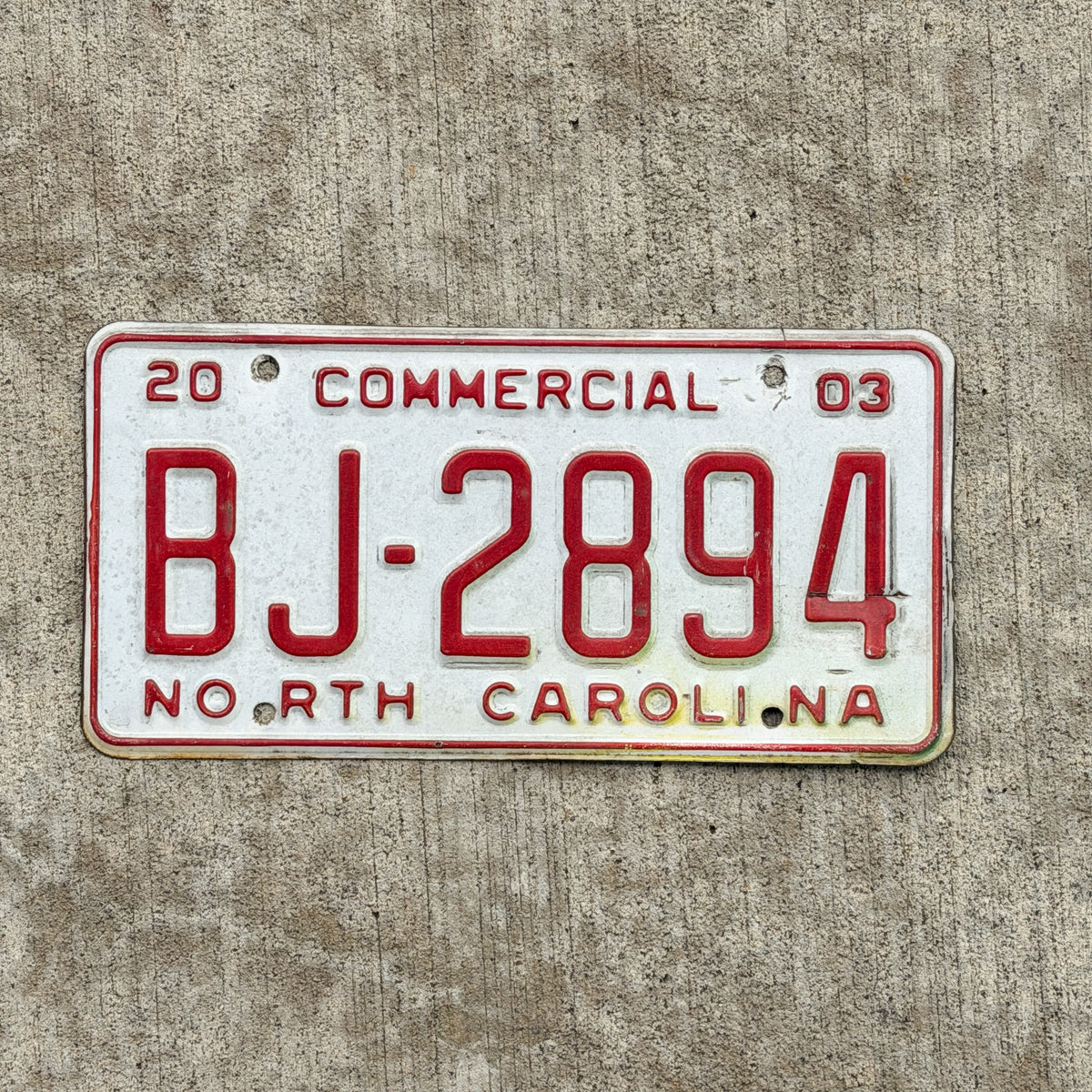 Photo of a 2003 North Carolina Commercial License Plate Auto Tag Garage Decor Vintage BJ 2894 with original patina